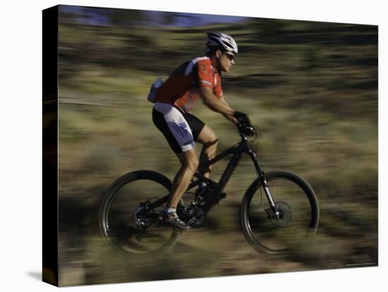 Fast Moving Mountain Biker, Mt. Bike-Michael Brown-Stretched Canvas