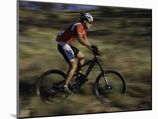 Fast Moving Mountain Biker, Mt. Bike-Michael Brown-Mounted Photographic Print