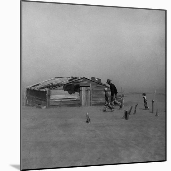 Father and Children Outside Wooden Shack That Serves as their House in the Dust Bowl-null-Mounted Photographic Print