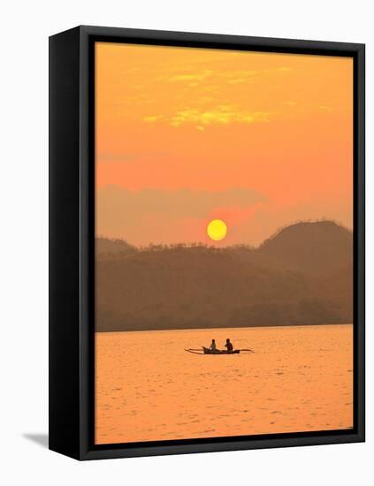 Father and daughter fishing at sunset near Lewolin Village-Stuart Westmorland-Framed Stretched Canvas