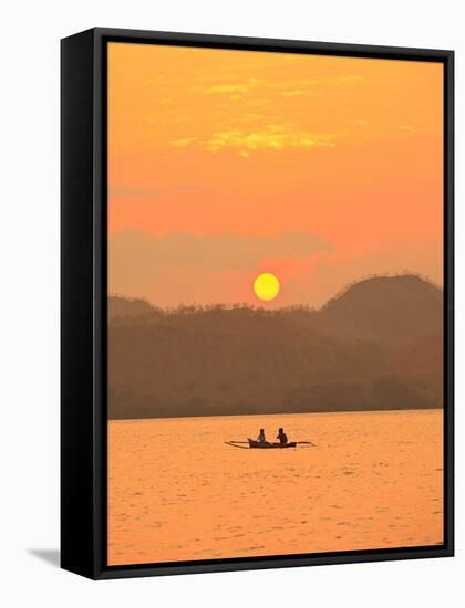 Father and daughter fishing at sunset near Lewolin Village-Stuart Westmorland-Framed Stretched Canvas