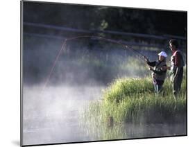 Father and Daughter Fishing-null-Mounted Photographic Print