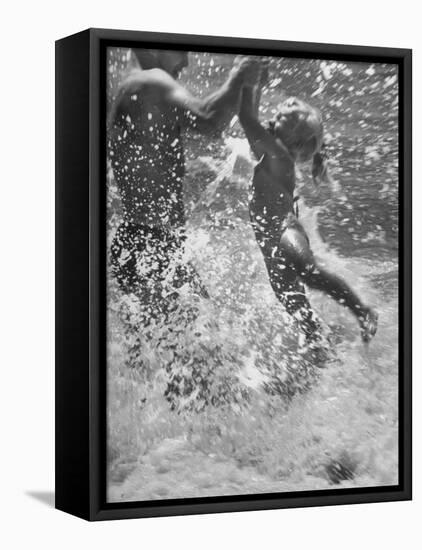 Father and Daughter Playing in the Surf at Jones Beach-Alfred Eisenstaedt-Framed Stretched Canvas