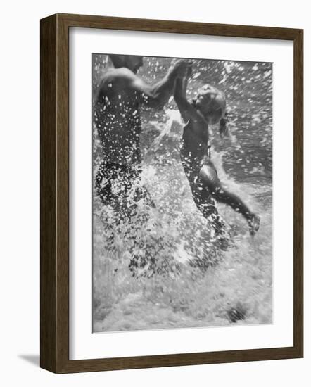 Father and Daughter Playing in the Surf at Jones Beach-Alfred Eisenstaedt-Framed Photographic Print