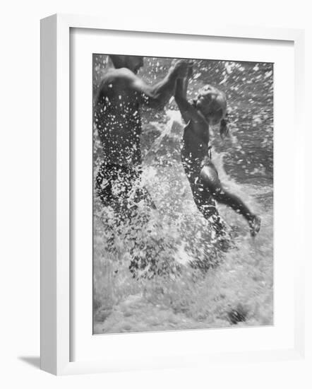 Father and Daughter Playing in the Surf at Jones Beach-Alfred Eisenstaedt-Framed Photographic Print