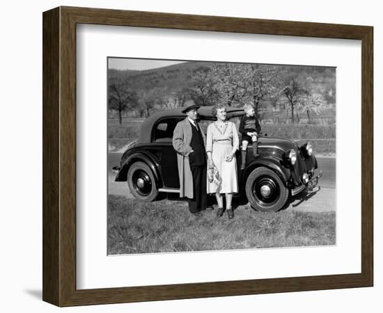 Father and Mother Stand with their Son Sitting on the Hood of their Mercedes Automobile, Ca. 1950-null-Framed Photographic Print