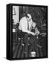 Father and Son Enjoy Christmas Morning, Ca. 1950-null-Framed Stretched Canvas