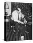Father and Son Enjoy Christmas Morning, Ca. 1950-null-Stretched Canvas