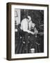 Father and Son Enjoy Christmas Morning, Ca. 1950-null-Framed Photographic Print