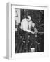 Father and Son Enjoy Christmas Morning, Ca. 1950-null-Framed Photographic Print