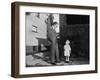 Father and Son Look at Each Other on Sidewalk, Ca. 1930.-Kirn Vintage Stock-Framed Photographic Print