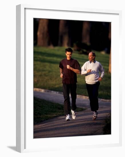 Father and Son Out for a Fitness Run-Paul Sutton-Framed Photographic Print