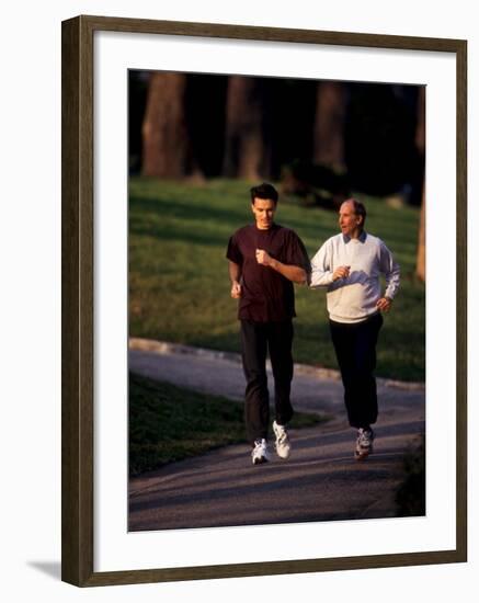 Father and Son Out for a Fitness Run-Paul Sutton-Framed Photographic Print