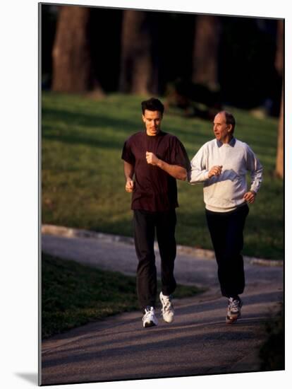 Father and Son Out for a Fitness Run-Paul Sutton-Mounted Photographic Print