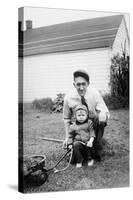 Father and Son Pull a Wagon in Backyard, Ca. 1946-null-Stretched Canvas