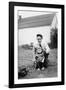 Father and Son Pull a Wagon in Backyard, Ca. 1946-null-Framed Photographic Print