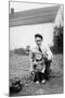 Father and Son Pull a Wagon in Backyard, Ca. 1946-null-Mounted Photographic Print