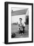 Father and Son Pull a Wagon in Backyard, Ca. 1946-null-Framed Photographic Print