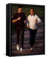 Father and Son Running Togerther for Exercise, New York, New York, USA-Paul Sutton-Framed Stretched Canvas