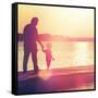 Father and Son Walking Out on a Dock at Sunset-soupstock-Framed Stretched Canvas