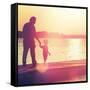 Father and Son Walking Out on a Dock at Sunset-soupstock-Framed Stretched Canvas