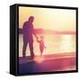 Father and Son Walking Out on a Dock at Sunset-soupstock-Framed Stretched Canvas