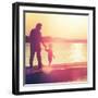 Father and Son Walking Out on a Dock at Sunset-soupstock-Framed Photographic Print