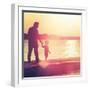 Father and Son Walking Out on a Dock at Sunset-soupstock-Framed Photographic Print