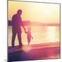 Father and Son Walking Out on a Dock at Sunset-soupstock-Mounted Photographic Print