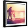 Father and Son Walking Out on a Dock at Sunset-soupstock-Framed Photographic Print