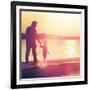 Father and Son Walking Out on a Dock at Sunset-soupstock-Framed Photographic Print