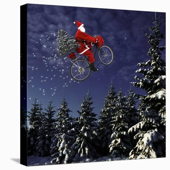 Father Christmas Flying Through Winter Landscape-null-Stretched Canvas