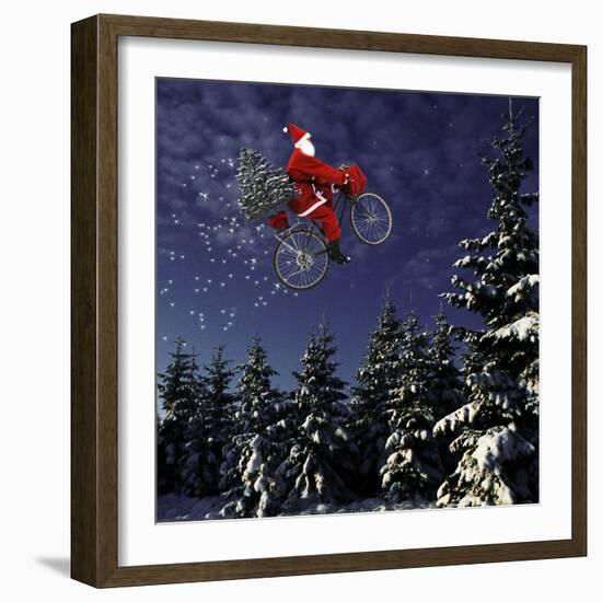 Father Christmas Flying Through Winter Landscape-null-Framed Photographic Print