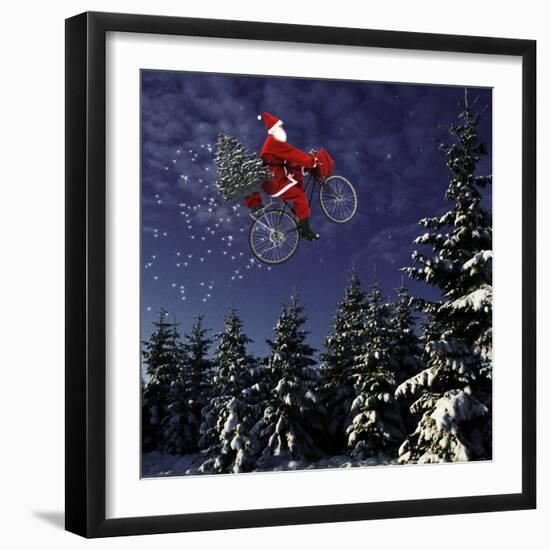 Father Christmas Flying Through Winter Landscape-null-Framed Photographic Print