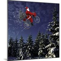 Father Christmas Flying Through Winter Landscape-null-Mounted Photographic Print