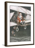 Father Christmas in an Aeroplane-CT Hill-Framed Art Print