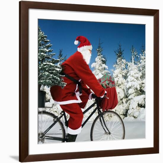 Father Christmas on Bicycle Cycling Past Fir-Ake Lindau and Johan De Meester-Framed Photographic Print