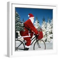 Father Christmas on Bicycle Cycling Past Fir-Ake Lindau and Johan De Meester-Framed Photographic Print