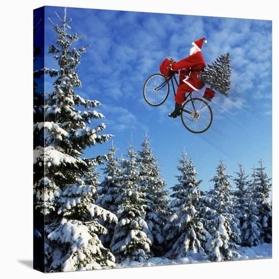 Father Christmas on Bicycle Flying Through the Air-null-Stretched Canvas