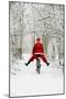 Father Christmas Riding Bicycle in Snowy Woodland Path-null-Mounted Photographic Print