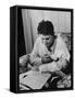 Father Feeding His Baby So That His Wife Can Go to the Movies-Alfred Eisenstaedt-Framed Stretched Canvas