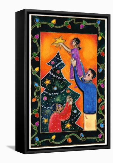 Father Lifting Girl to Put Star on Top of Christmas Tree-Stockbyte-Framed Stretched Canvas