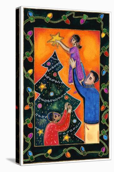 Father Lifting Girl to Put Star on Top of Christmas Tree-Stockbyte-Stretched Canvas