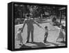 Father Playing in Yard with His Children-Wallace Kirkland-Framed Stretched Canvas