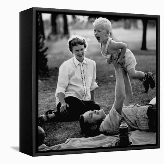 Father Playing with His Child During a Picnic-Allan Grant-Framed Stretched Canvas