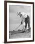 Father Teaching His Small Son How to Play Golf-null-Framed Photographic Print