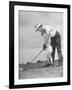 Father Teaching His Small Son How to Play Golf-null-Framed Photographic Print