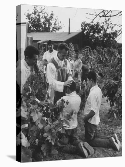 Father Thomas Mccullough Holding Religious Service for Migrant Mexican Farm Laborers in a Work Camp-null-Stretched Canvas