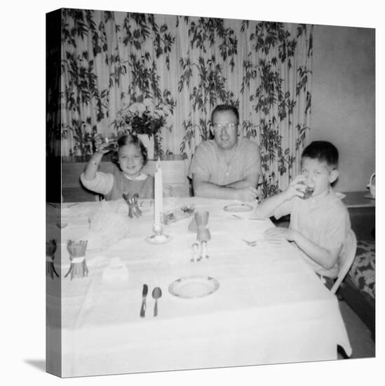 Father with Children at the Dinner Table, Ca. 1962-null-Stretched Canvas