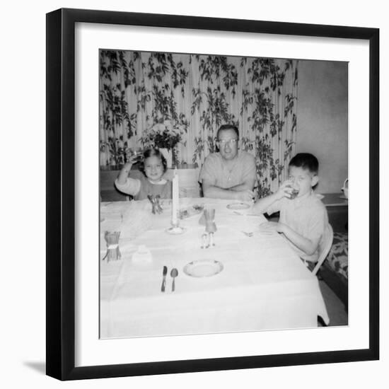 Father with Children at the Dinner Table, Ca. 1962-null-Framed Photographic Print